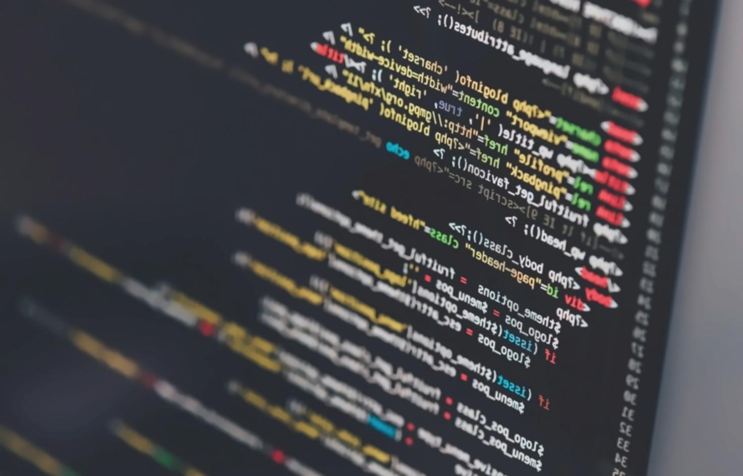Mobile development workspace showing code and design process